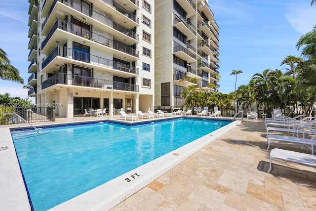 801 N Venetian Dr Unit 201, Miami, FL 33139 - community pool featuring a patio