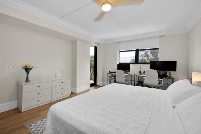 801 N Venetian Dr Unit 201, Miami, FL 33139 - bedroom featuring crown molding, a desk, wood finished floors, ceiling fan, and access to exterior