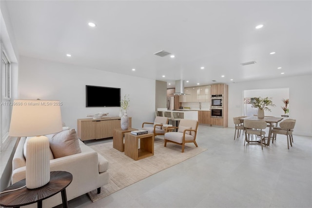 326 SE 3rd St, Dania Beach, FL 33004 - living area with recessed lighting and concrete floors