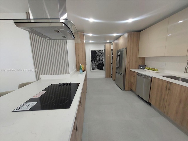 kitchen featuring stainless steel appliances, light countertops, a sink, modern cabinets, and extractor fan