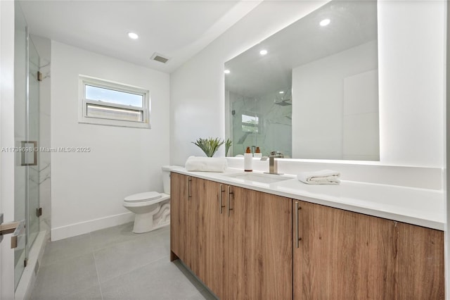 bathroom featuring a marble finish shower, baseboards, visible vents, toilet, and vanity