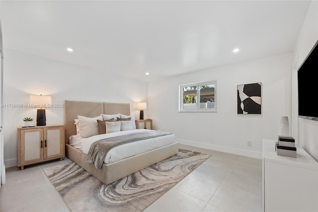 bedroom featuring recessed lighting and baseboards