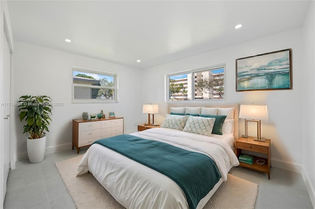 bedroom featuring recessed lighting and baseboards