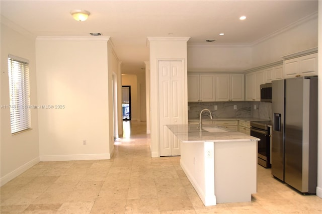 kitchen with decorative backsplash, ornamental molding, stainless steel appliances, and a sink