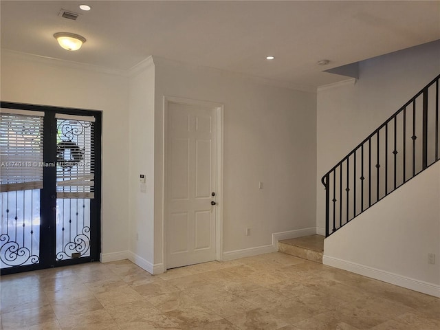 foyer entrance featuring stairway, recessed lighting, baseboards, and ornamental molding