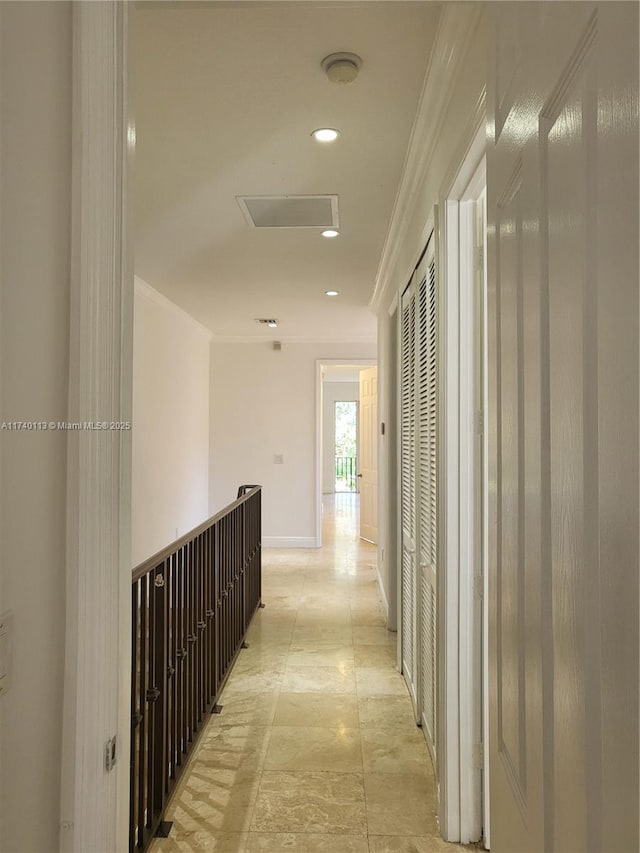 hallway featuring recessed lighting, baseboards, and ornamental molding