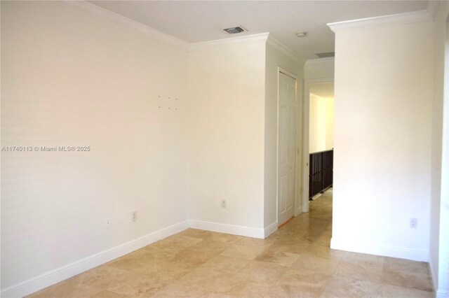 spare room with crown molding, french doors, and a textured ceiling