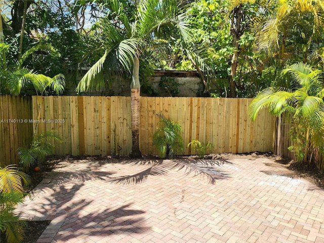 view of patio with fence