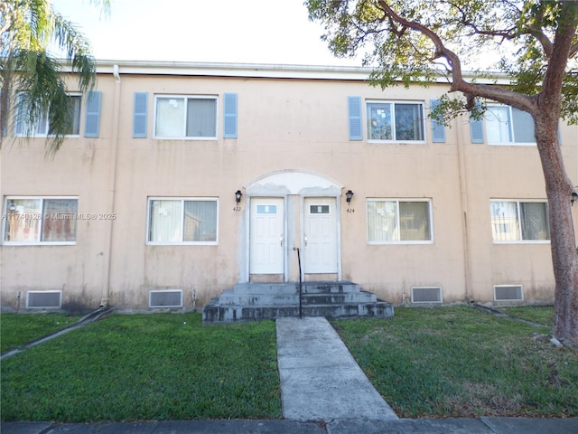 view of property with a front yard