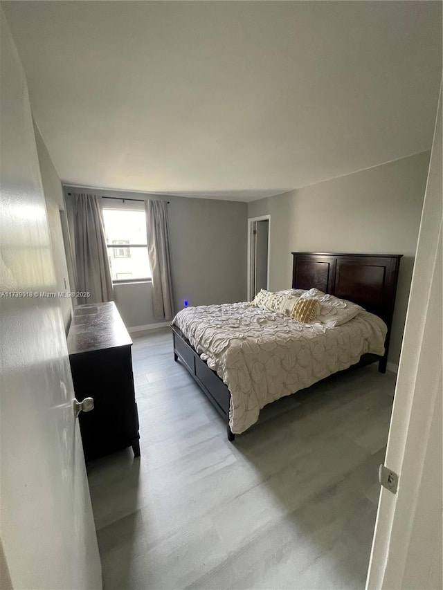 bedroom featuring light hardwood / wood-style flooring