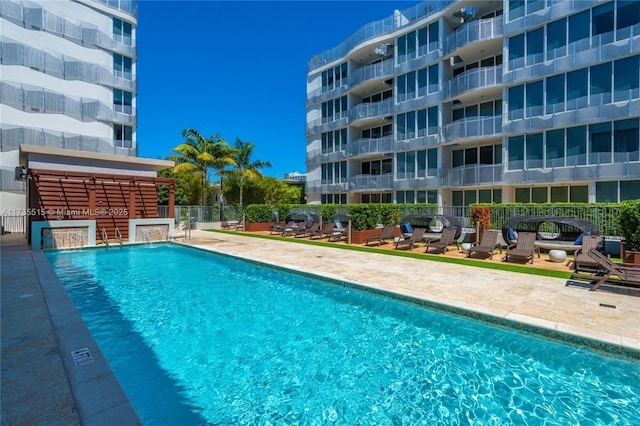 view of pool featuring a patio