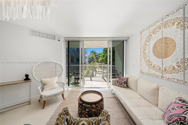 living room with floor to ceiling windows