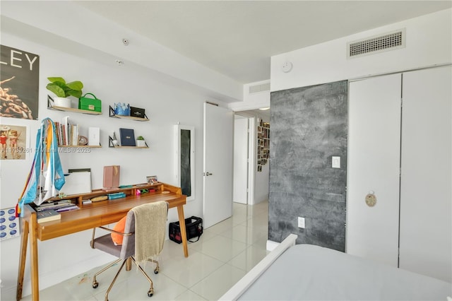 office space with light tile patterned floors