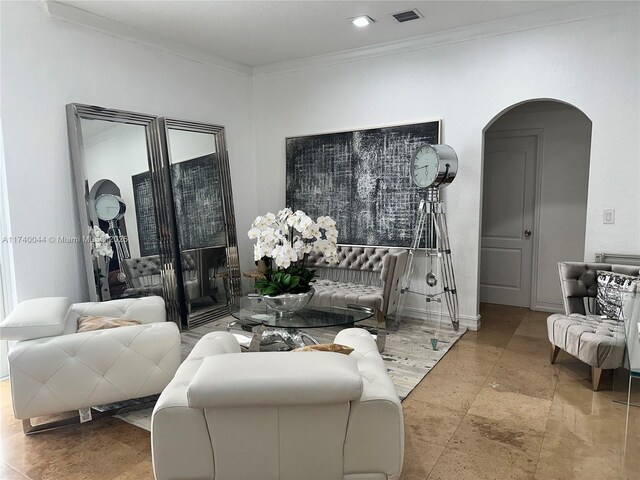 living room with ornamental molding