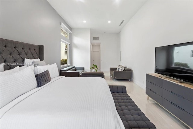 bedroom with light hardwood / wood-style floors