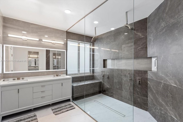 bathroom featuring vanity and walk in shower