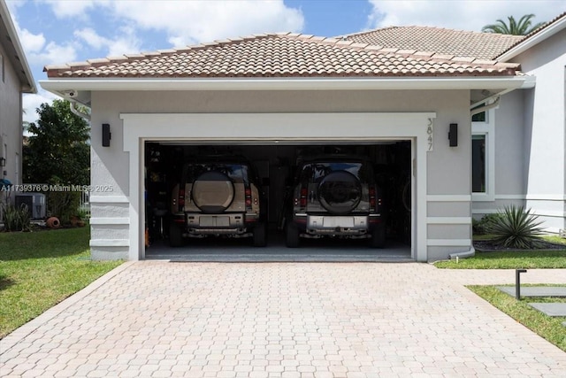 garage with central air condition unit