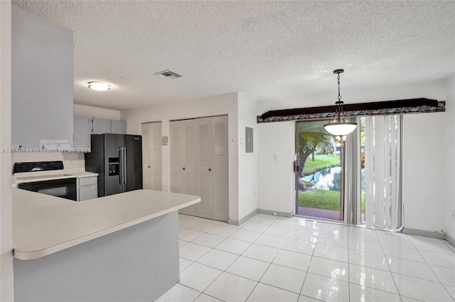 kitchen featuring range with electric cooktop, high quality fridge, pendant lighting, white cabinetry, and kitchen peninsula