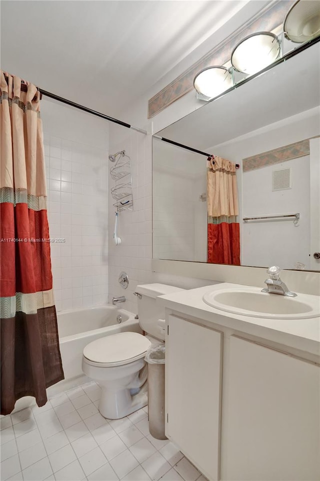 full bathroom with vanity, shower / tub combo with curtain, tile patterned floors, and toilet