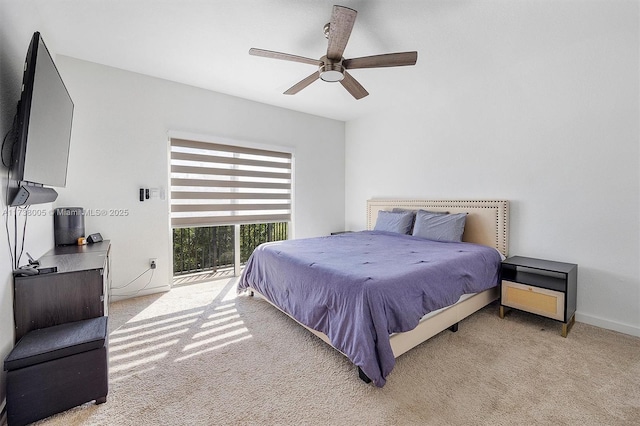 carpeted bedroom with access to exterior and ceiling fan