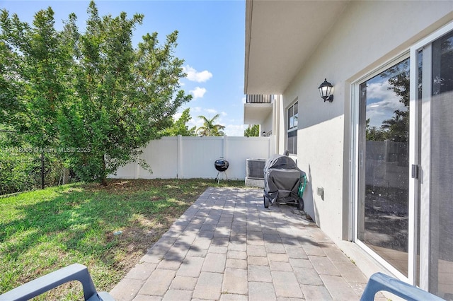 view of patio with central AC