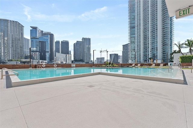 community pool featuring a view of city