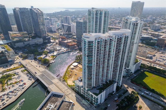 aerial view featuring a water view and a city view