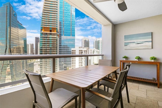 balcony featuring ceiling fan