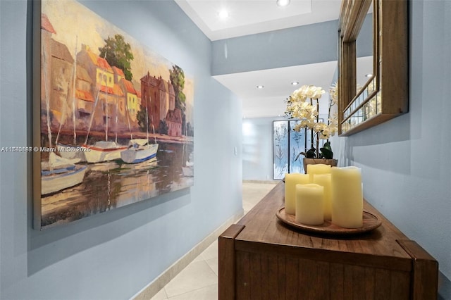 hallway featuring light tile patterned flooring