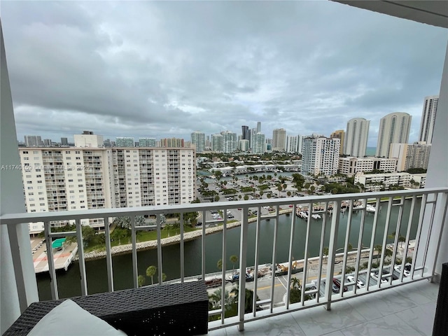 balcony featuring a water view