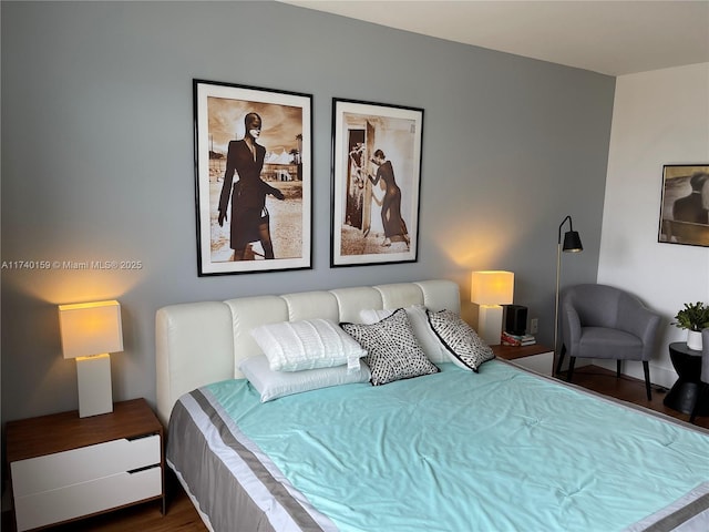 bedroom featuring dark hardwood / wood-style floors