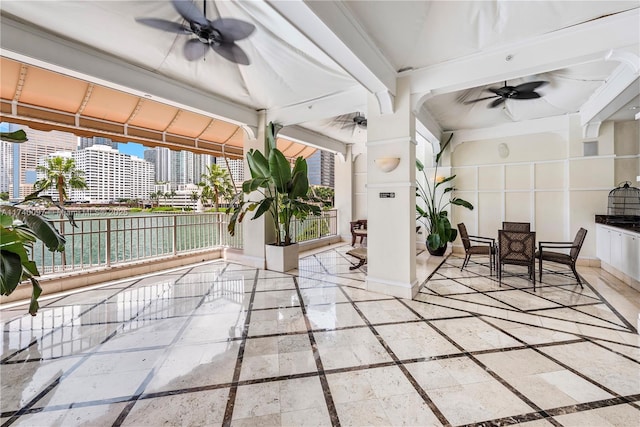 interior space featuring ceiling fan