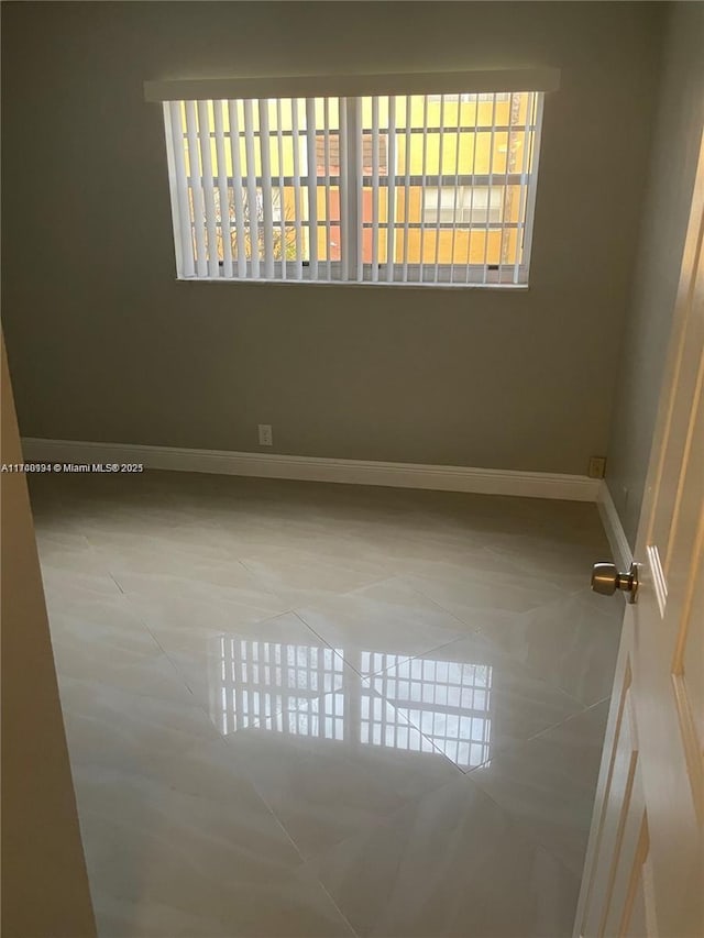 view of tiled empty room