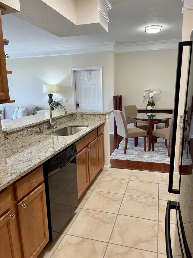 kitchen with light stone counters, sink, ornamental molding, and dishwasher