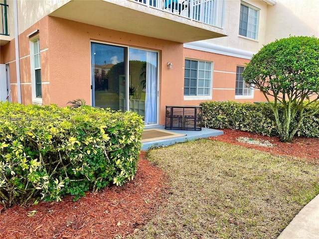 property entrance with a patio