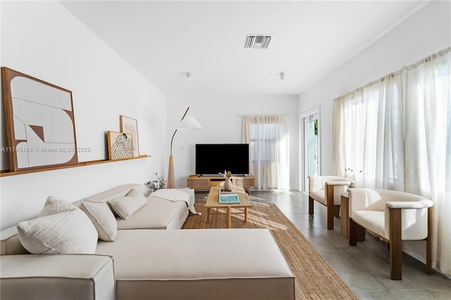 living room featuring light tile patterned flooring