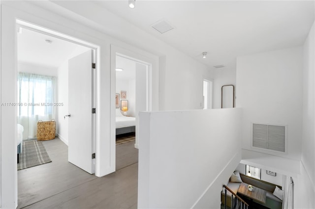 hallway featuring light hardwood / wood-style floors