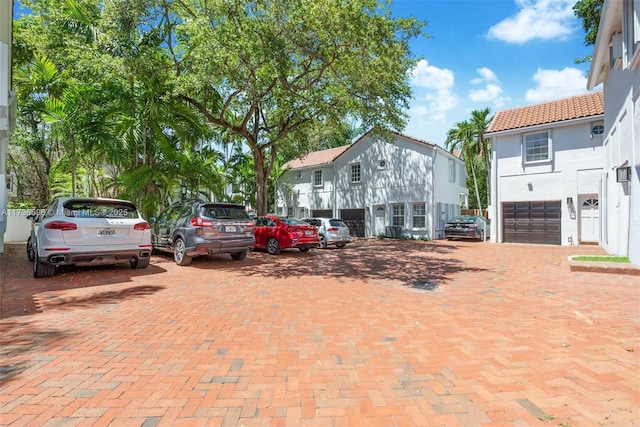 view of front of property with a garage