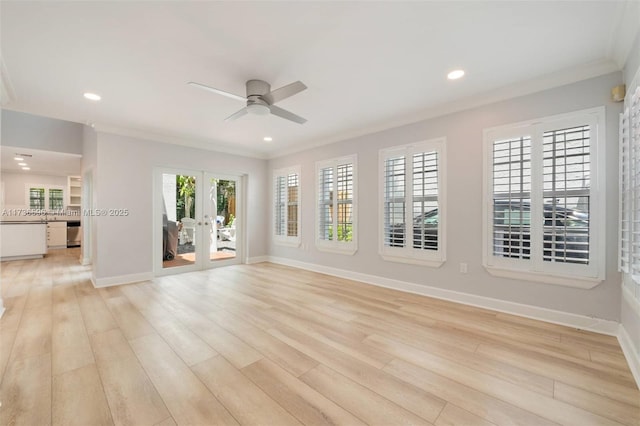 unfurnished room with french doors, ceiling fan, crown molding, and light wood-type flooring