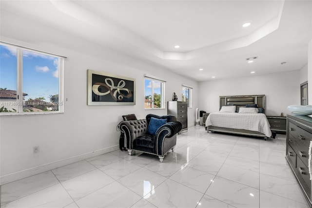 bedroom with marble finish floor, recessed lighting, a raised ceiling, visible vents, and baseboards