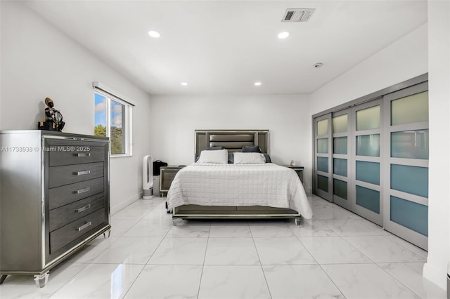 bedroom with recessed lighting, marble finish floor, visible vents, and baseboards