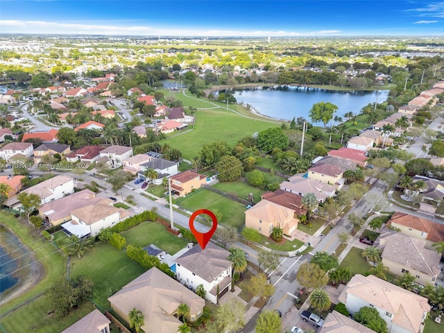 aerial view featuring a water view and a residential view