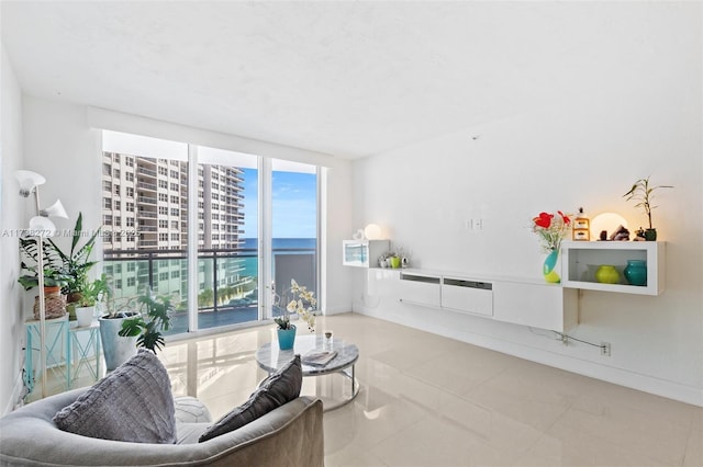 3001 S Ocean Dr Unit 647, Hollywood, FL 33019 - living area featuring a water view and tile patterned floors