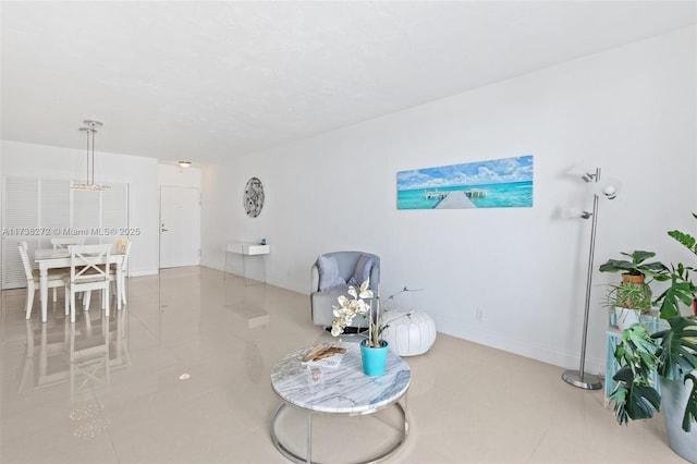 3001 S Ocean Dr Unit 647, Hollywood, FL 33019 - living room featuring tile patterned floors and baseboards