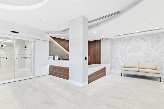 3001 S Ocean Dr Unit 647, Hollywood, FL 33019 - building lobby with wallpapered walls and recessed lighting