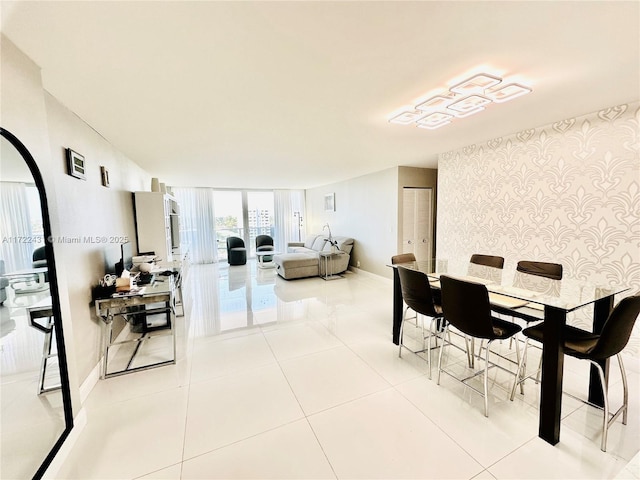 tiled dining space with baseboards