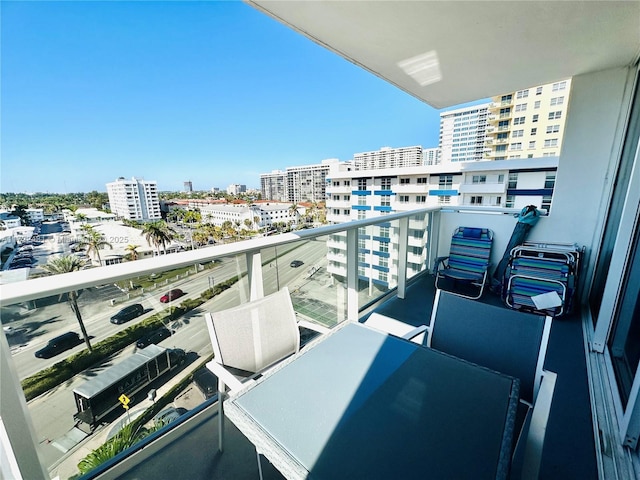 balcony featuring a city view