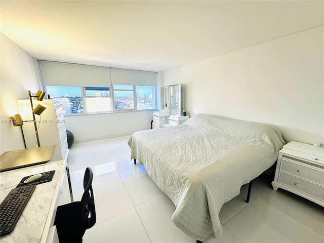 bedroom with tile patterned floors