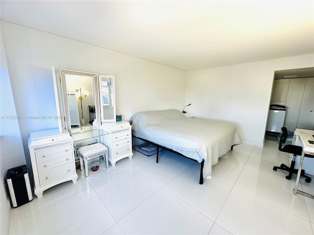 bedroom featuring light tile patterned floors