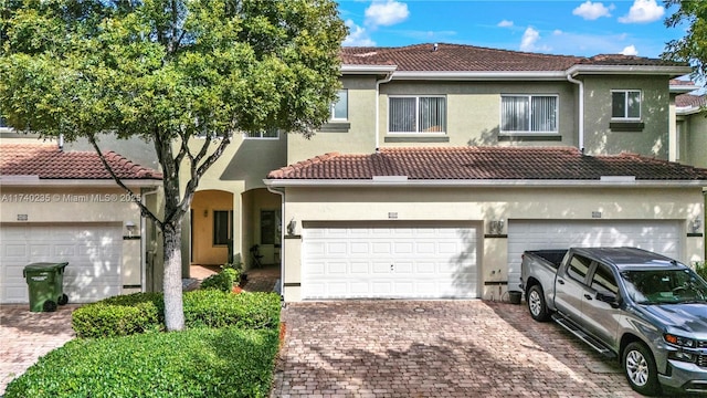 view of front of property featuring a garage